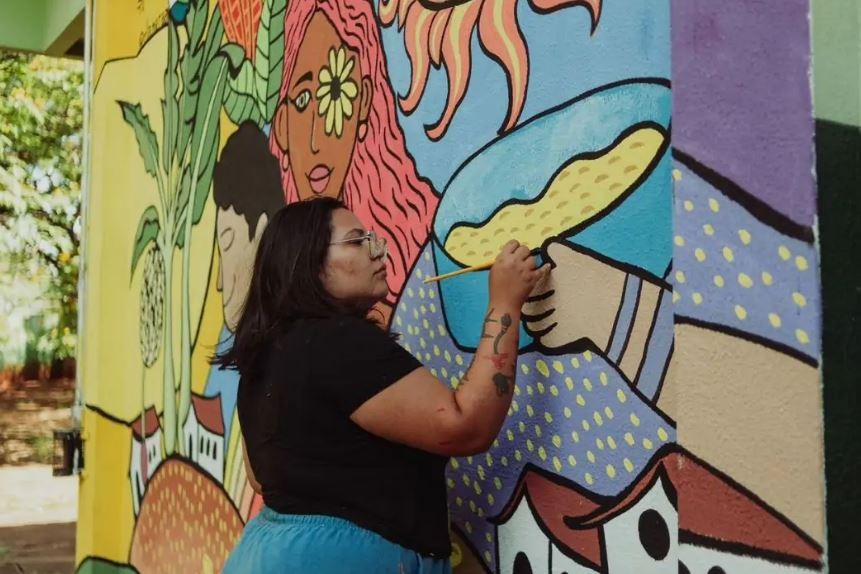 Artistas colorem muros de escolas públicas de Campo Grande