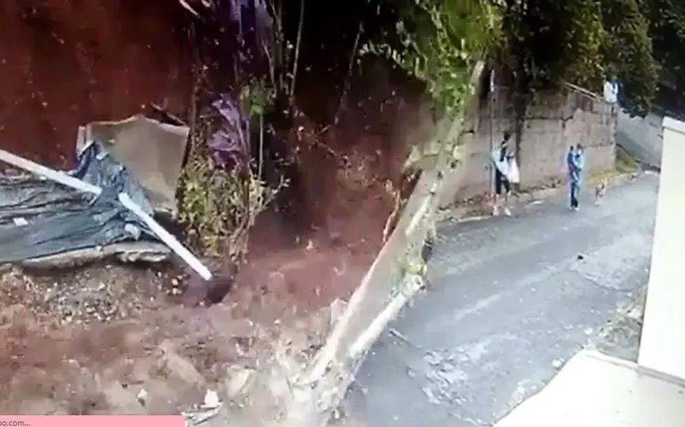 VÍDEO: Família com criança de colo escapa por pouco de queda de muro